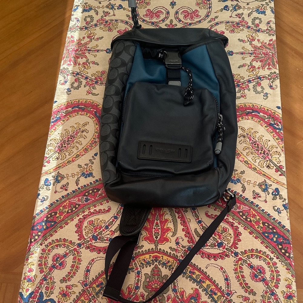 Coach men’s one strap back pack